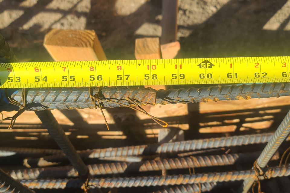 Measuring footing rebar before the pour